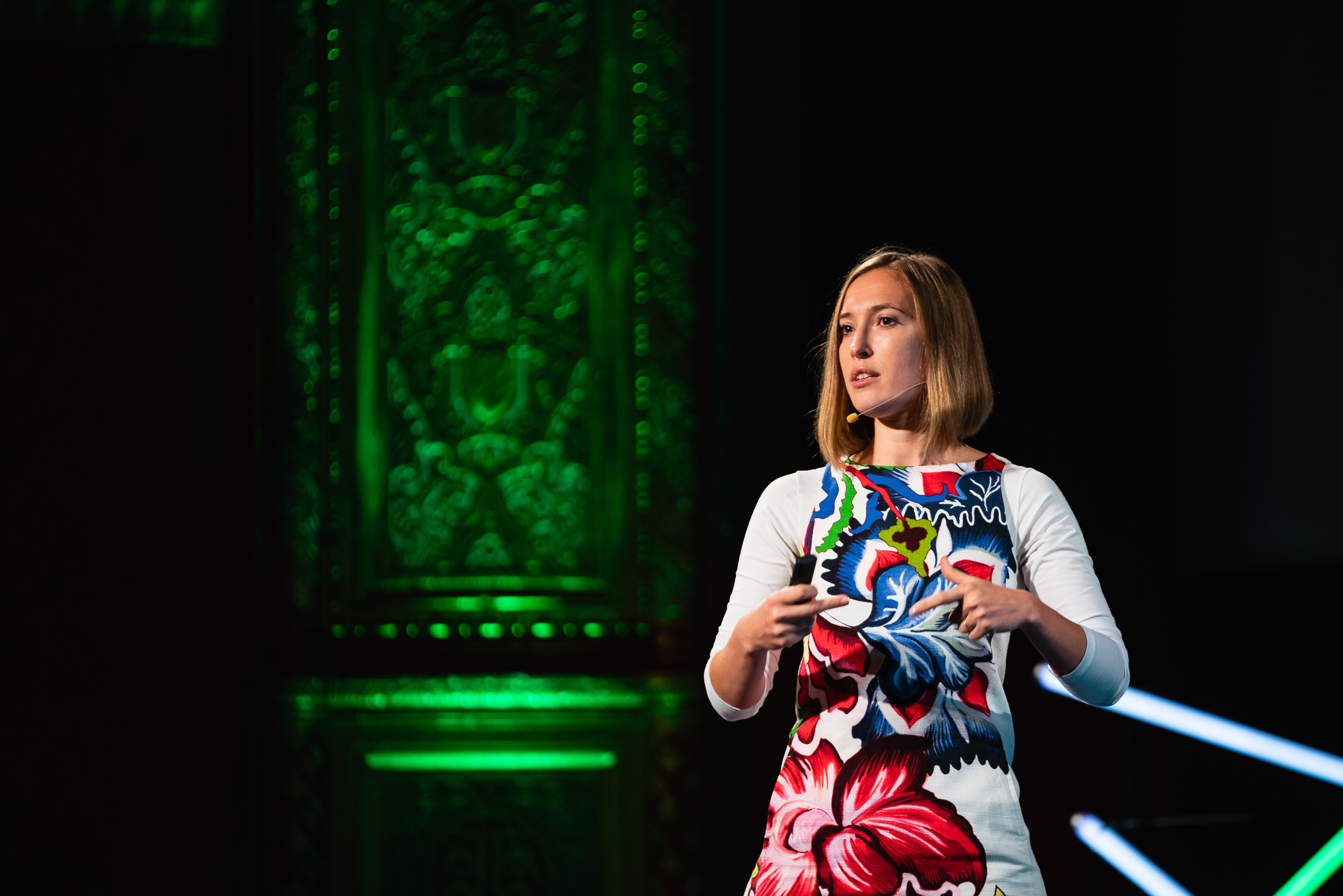 Lili David speaking on stage